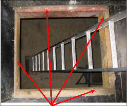 Trapdoor opened showing timber support underneath