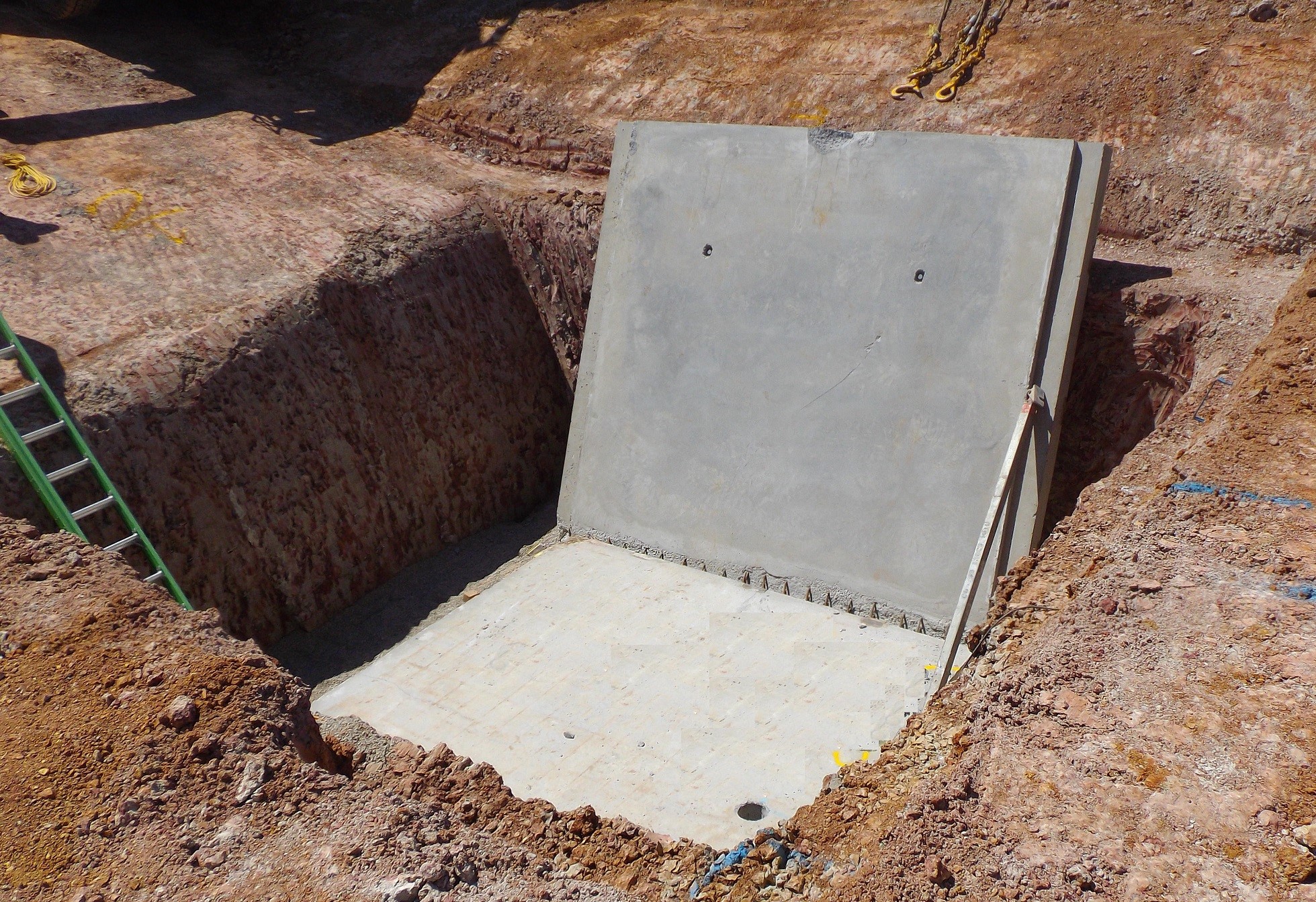 Partially completed pit with two panels removed