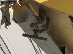 Photograph 10 – Clamp securing stair module to transom.