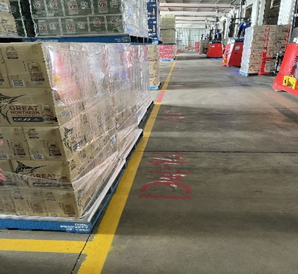 Stacked pallets and site floor paint
