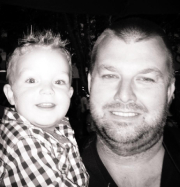 Brendon Stevens A black and white image of Brendon Stevens and a child.
